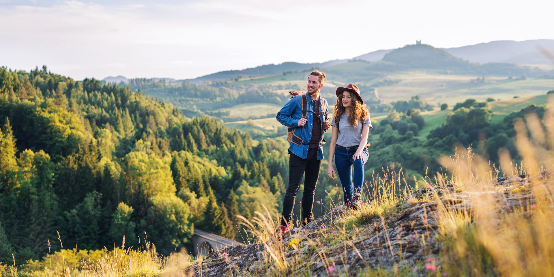 young-tourist-couple-travellers-with-backpacks-hik-2024-10-22-07-14-26-utc-2
